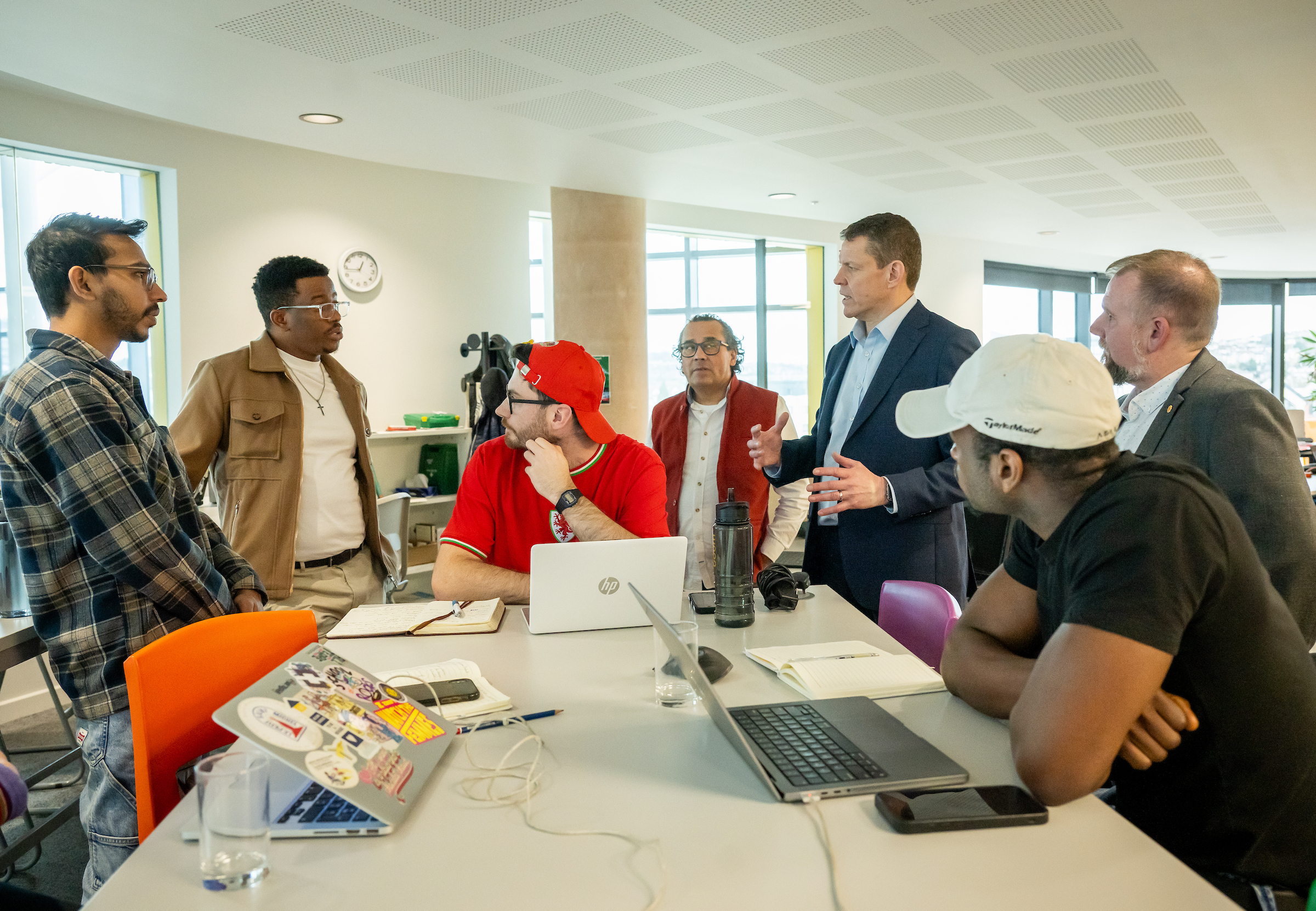 The Cymrai team in the studio with Rhun ap Iorwerth during a visit to Newport